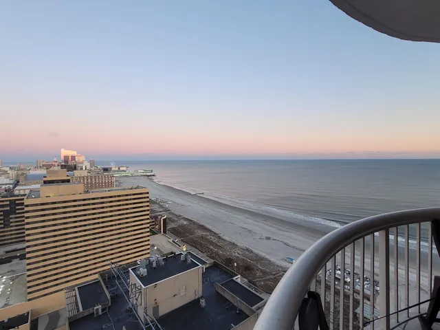a kitchen with stainless steel appliances kitchen island granite countertop a sink and cabinets