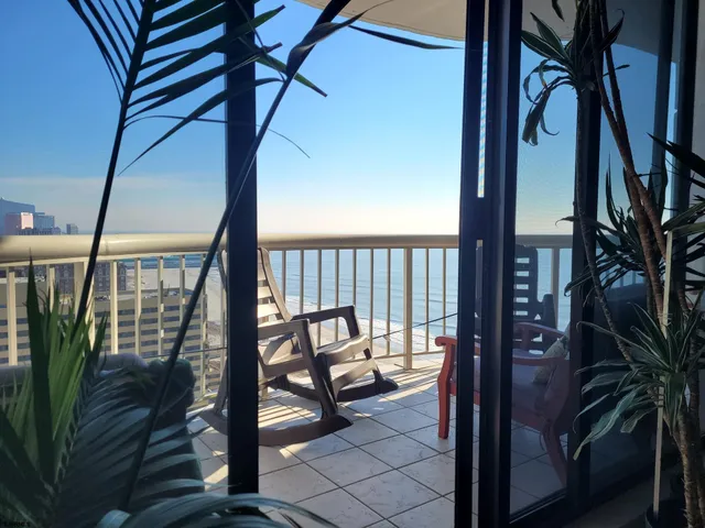 a kitchen with a sink appliances and cabinets