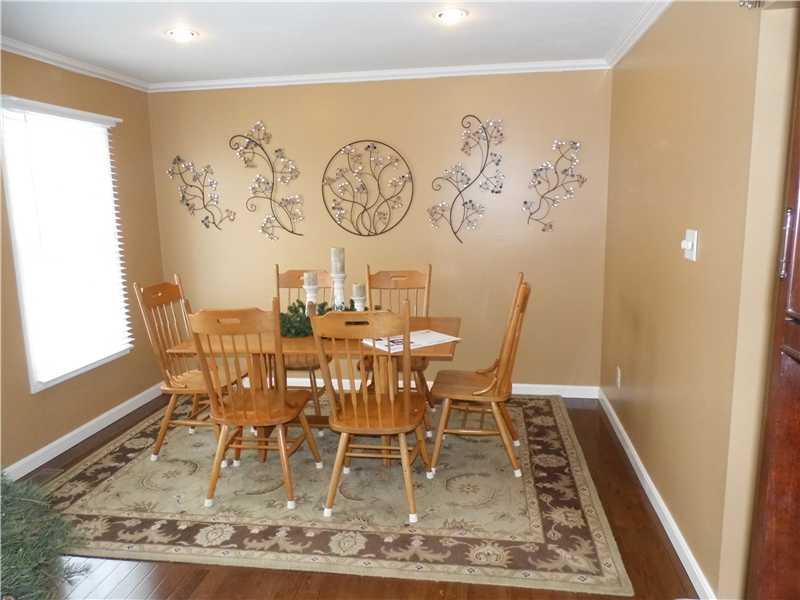251 Randy Lane Coraopolis, PA 15108 - Photo 12 of 18 Dining Room. Living Room / Dining Room, Loads of windows, recessed lighting and beautiful hardwood floors