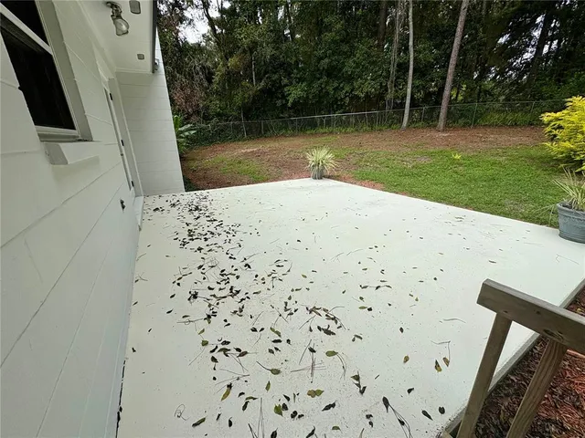 a view of a house with a yard and garage