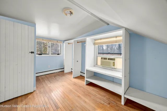 a view of livingroom with hardwood floor and a window
