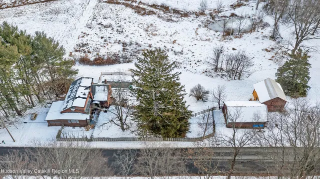 a view of house with outdoor space