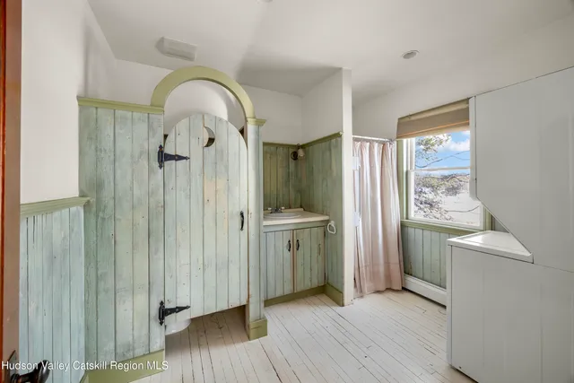 a view of entryway with wooden floor