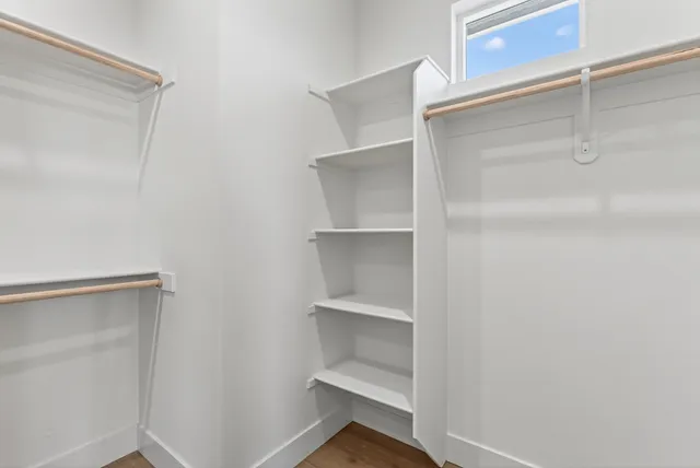 a storage room with wooden floor