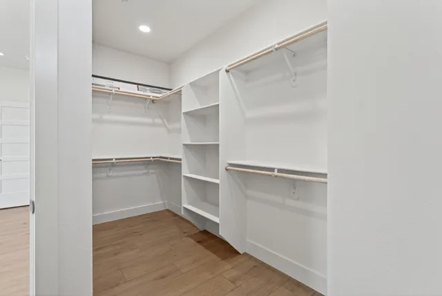 a view of an empty walk in closet