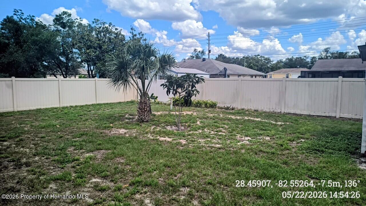 10244 Heathcliff Street Spring Hill, FL 34608 - Photo 28 of 30 a view of a backyard