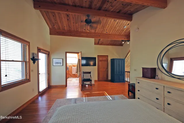 a room with furniture and view of living room