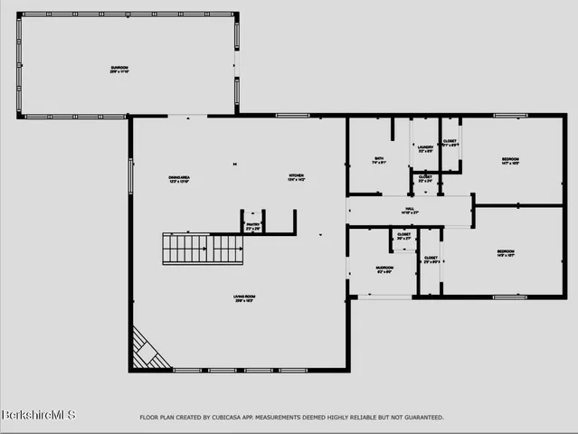 a view of a park that has large trees