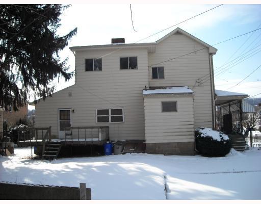Exterior Front. Winter at 103 Chestnut St