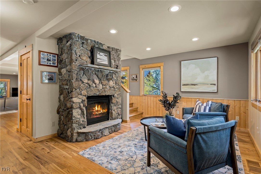 1089 Oxen Road Incline Village, NV 89451 - Photo 6 of 33 a living room with furniture a flat screen tv and a fireplace