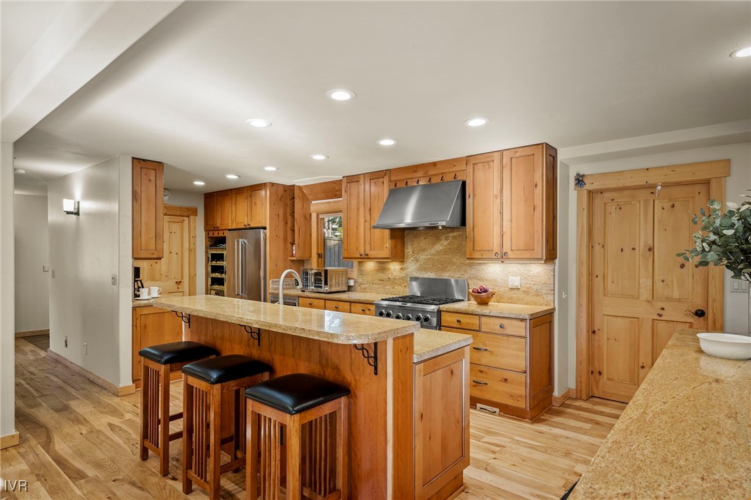 1089 Oxen Road Incline Village, NV 89451 - Photo 9 of 33 a kitchen with stainless steel appliances granite countertop a stove a sink and a refrigerator