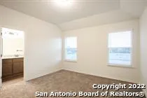 a view of a backyard of the house