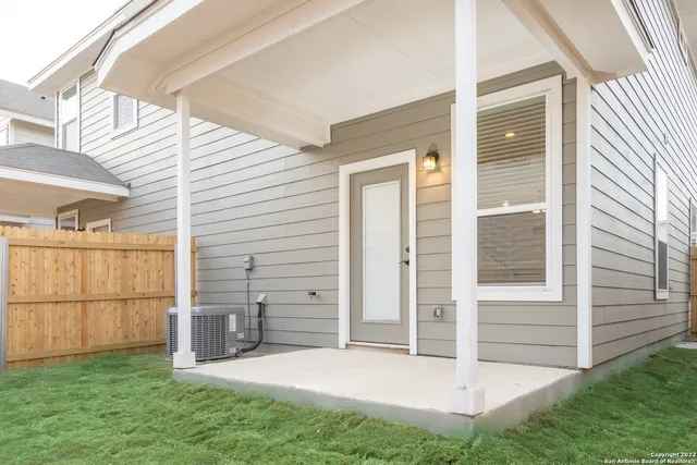 a view of a backyard of the house