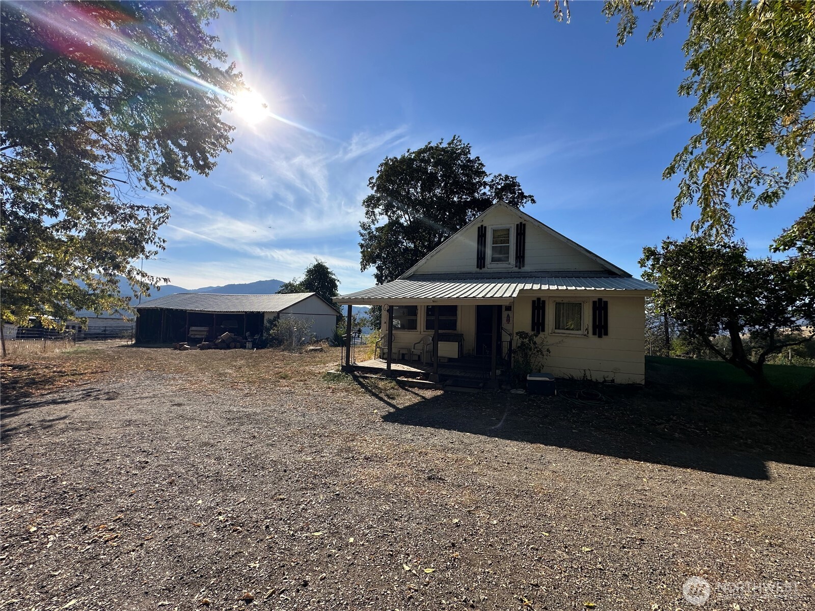 640 Highland Loop Road Kettle Falls, WA 99141 - Photo 12 of 38 a front view of a house with a yard