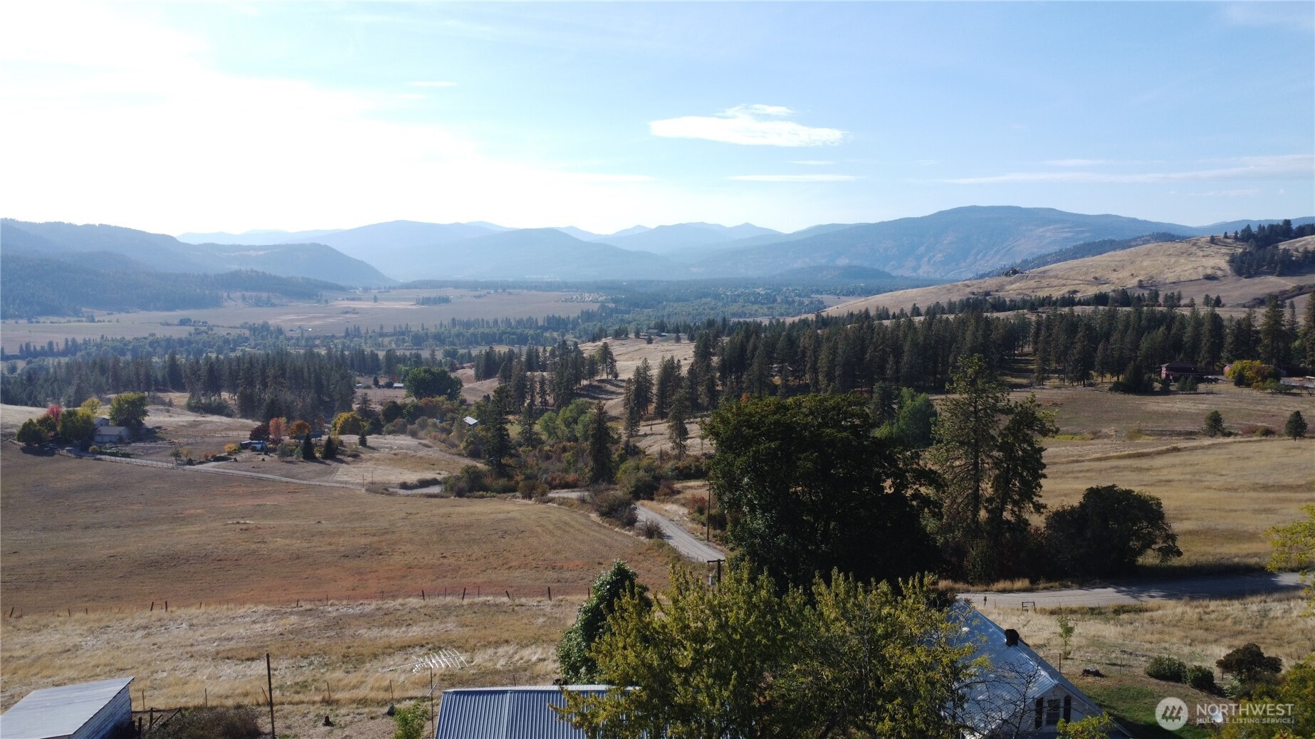 640 Highland Loop Road Kettle Falls, WA 99141 - Photo 2 of 38 a view of a outdoor space with mountain view