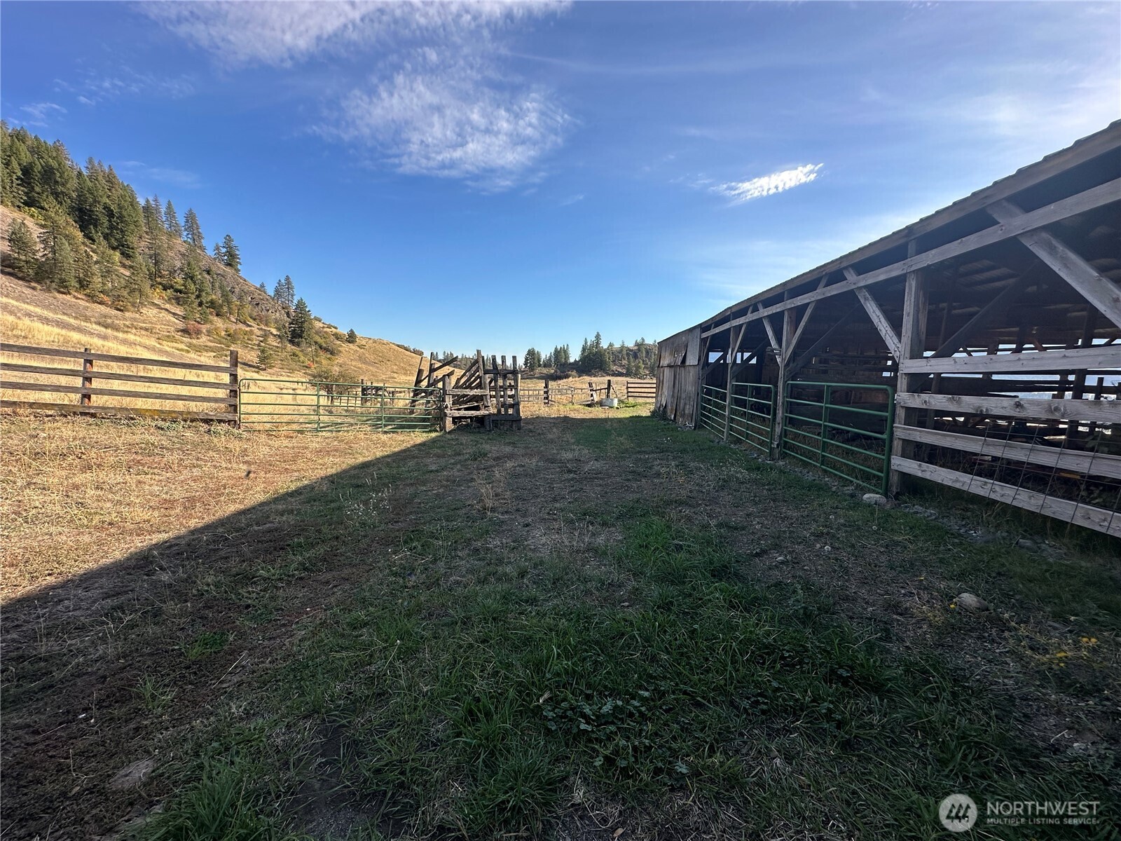 640 Highland Loop Road Kettle Falls, WA 99141 - Photo 26 of 38 a view of a yard with an outdoor space