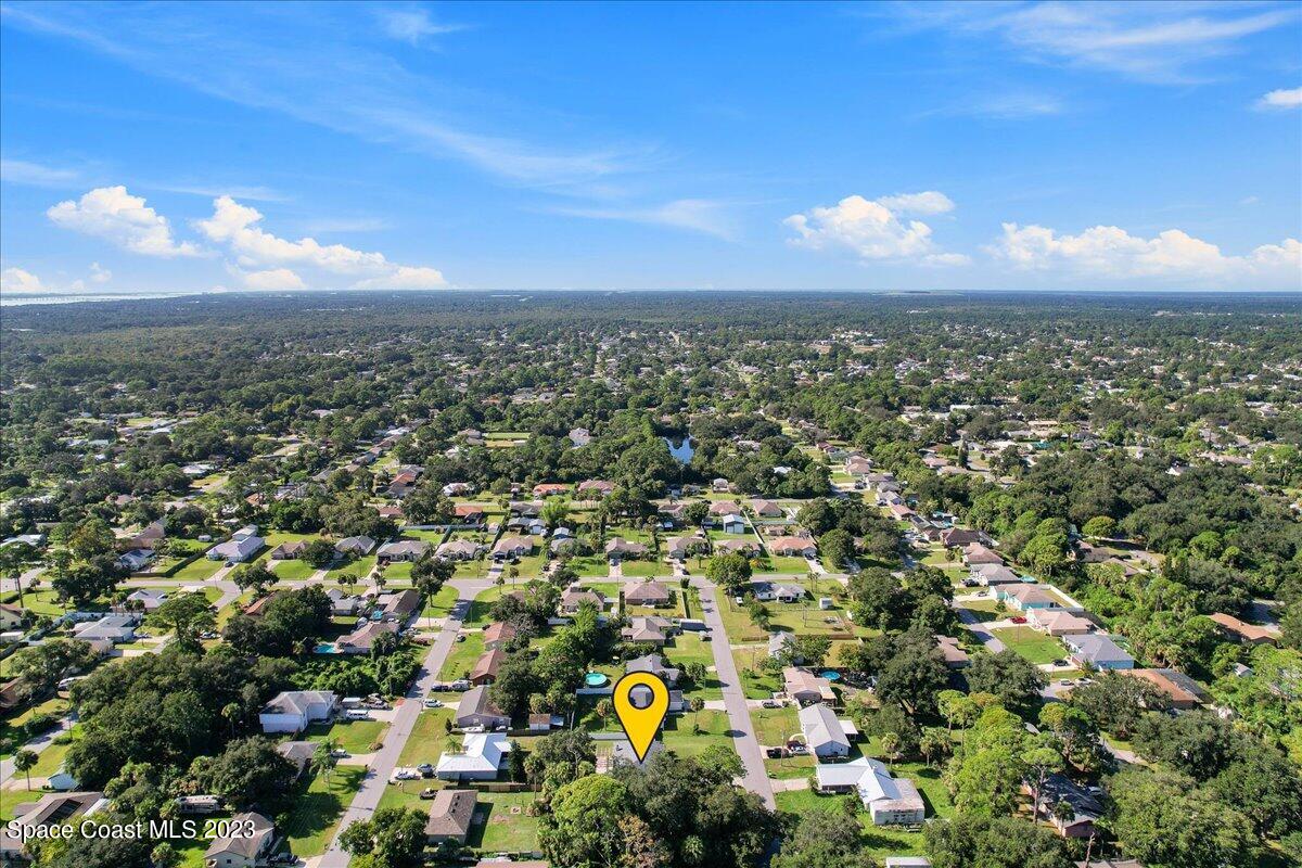 6949 Boston Road Cocoa, FL 32927 - Photo 30 of 33 an aerial view of a city
