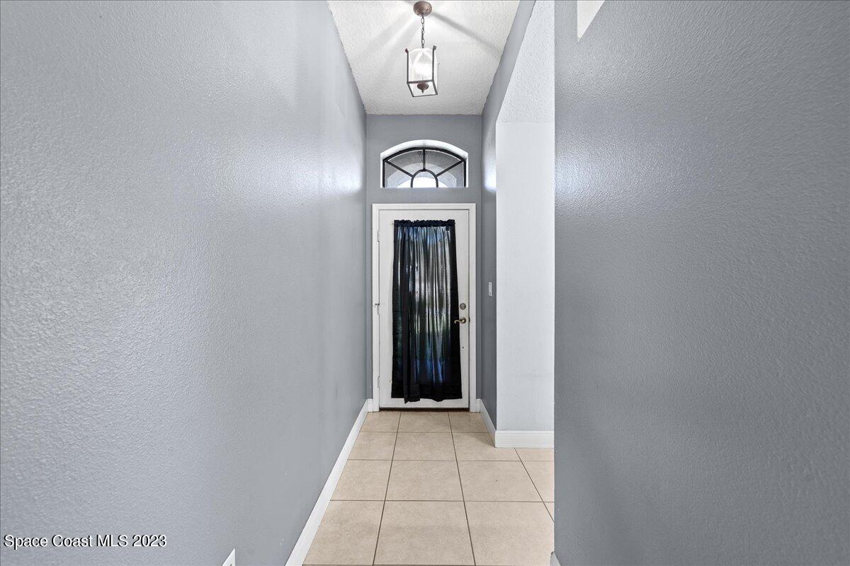 6949 Boston Road Cocoa, FL 32927 - Photo 4 of 33 a view of an entryway door
