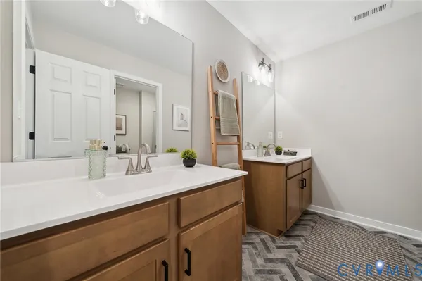 a bathroom with a toilet a sink and bathtub