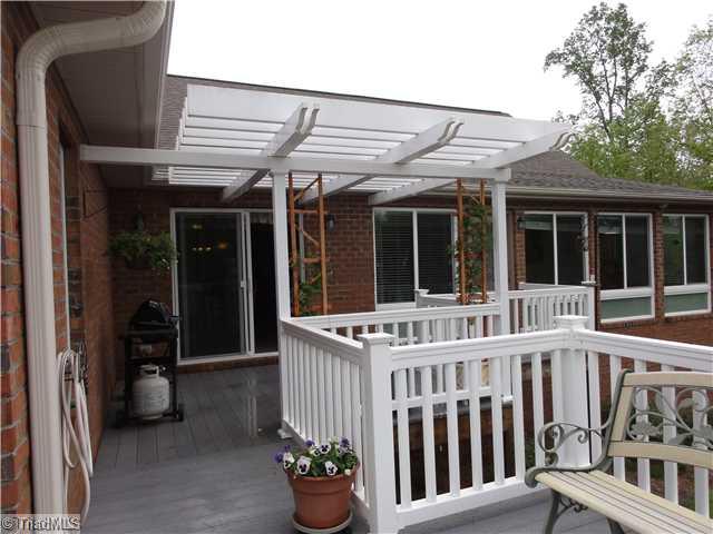 755 Hauser Road Pinnacle, NC 27043 - Photo 14 of 16 Exterior Back. Look at this deck! Plenty of space for BBQ, views and entertaining