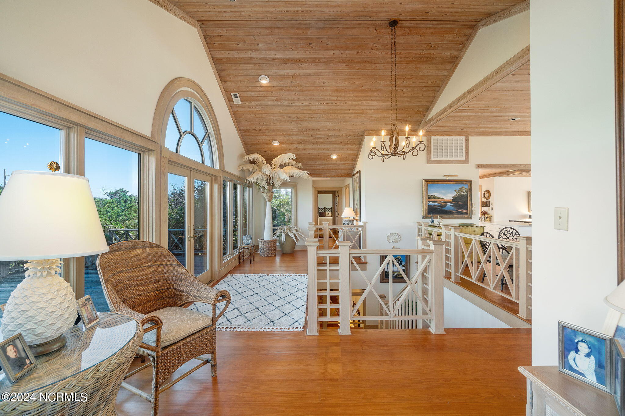 209 Salter Path Road Pine Knoll Shores, NC 28512 - Photo 24 of 73 Upper level hall and staircase