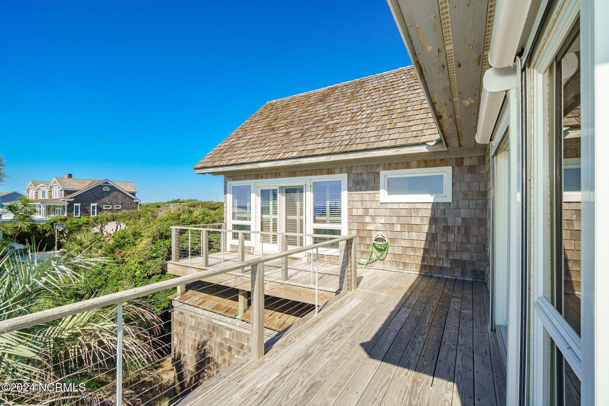 209 Salter Path Road Pine Knoll Shores, NC 28512 - Photo 31 of 73 Deck access from primary suite