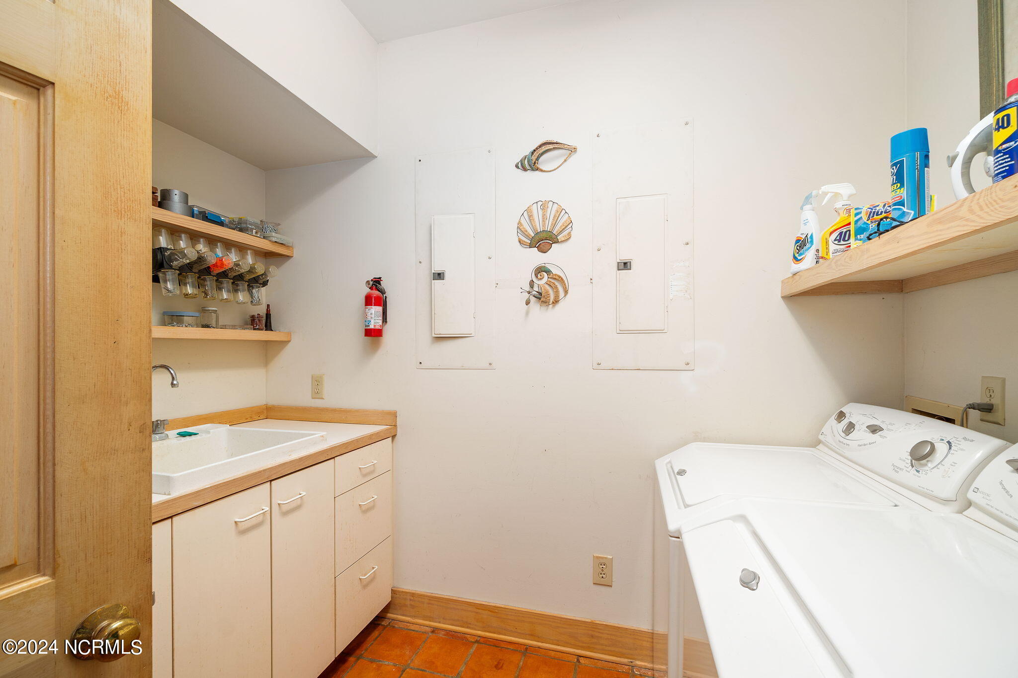 209 Salter Path Road Pine Knoll Shores, NC 28512 - Photo 46 of 73 Laundry room