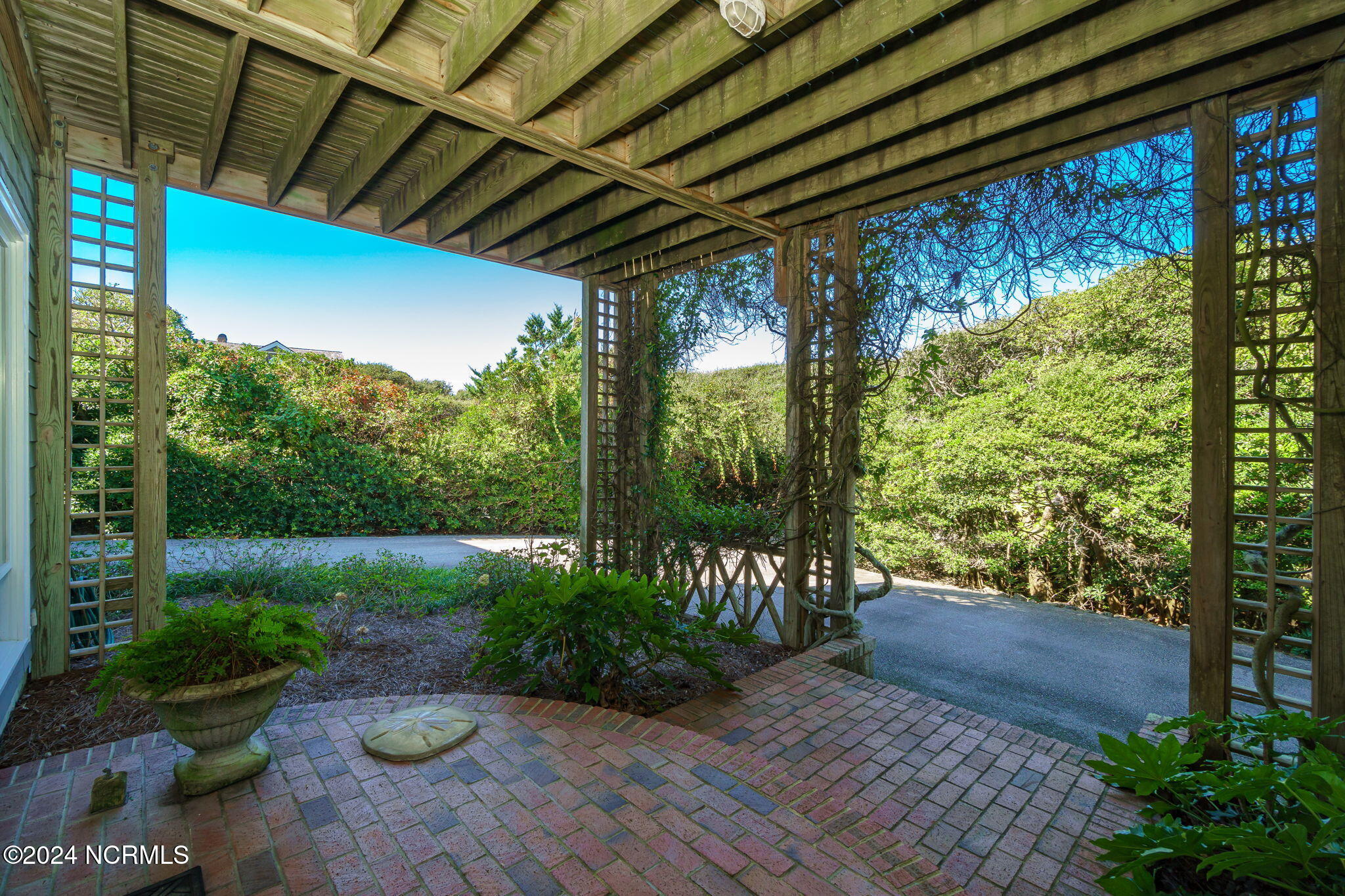 209 Salter Path Road Pine Knoll Shores, NC 28512 - Photo 49 of 73 Covered front patio