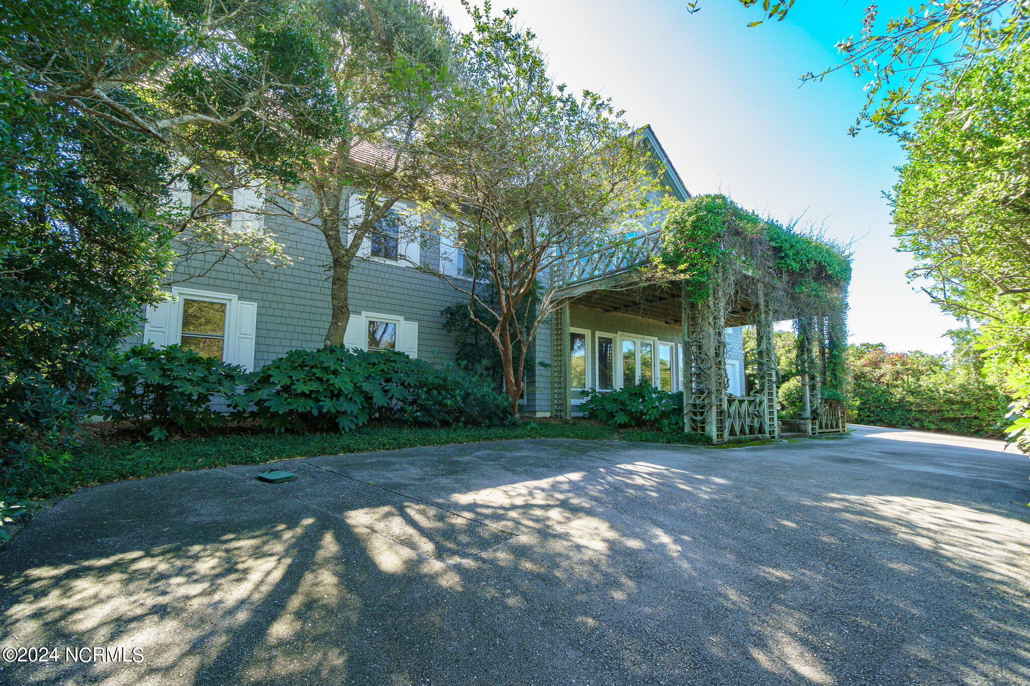 209 Salter Path Road Pine Knoll Shores, NC 28512 - Photo 50 of 73 Covered front patio