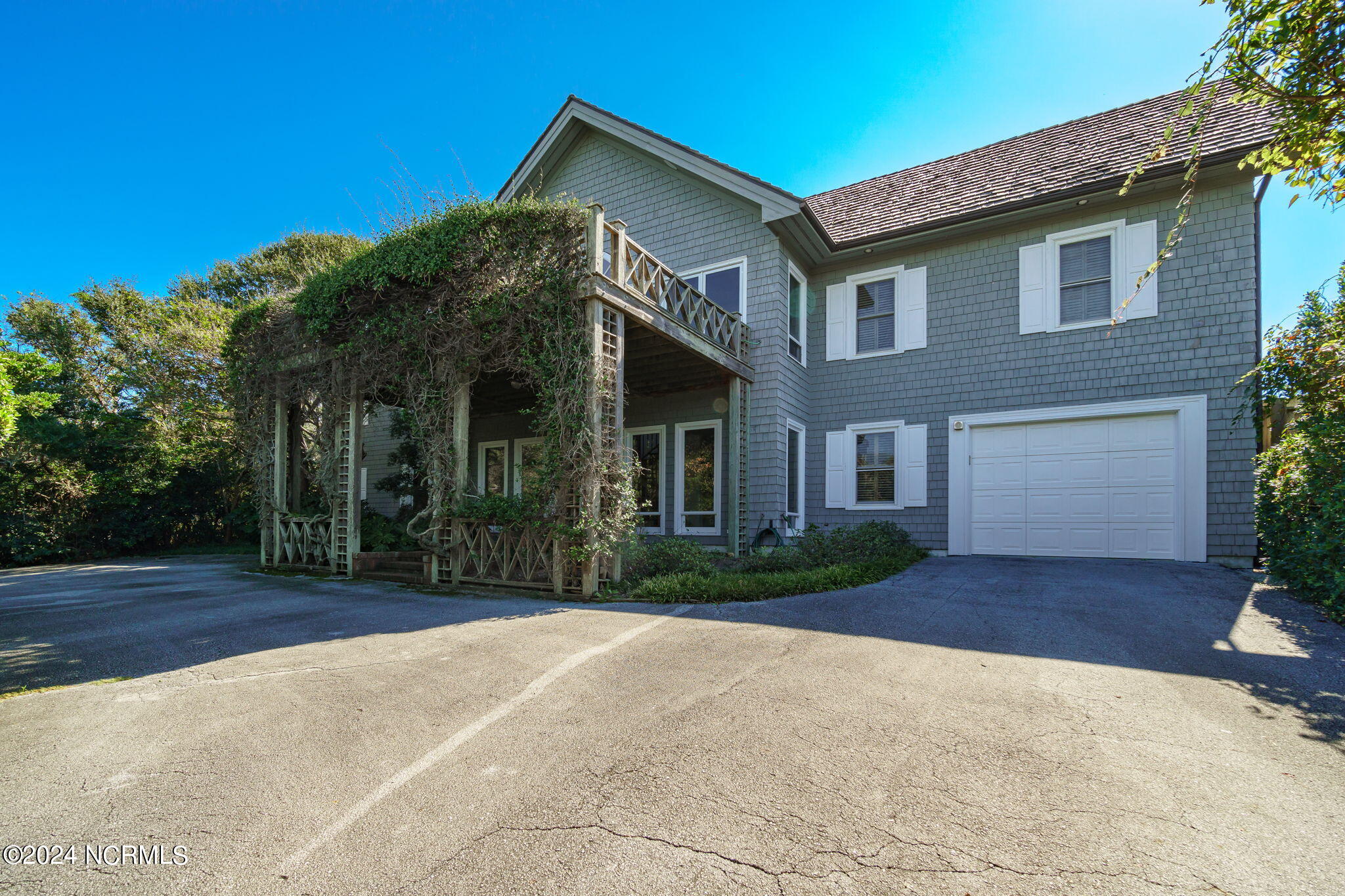209 Salter Path Road Pine Knoll Shores, NC 28512 - Photo 51 of 73 One car attached garage