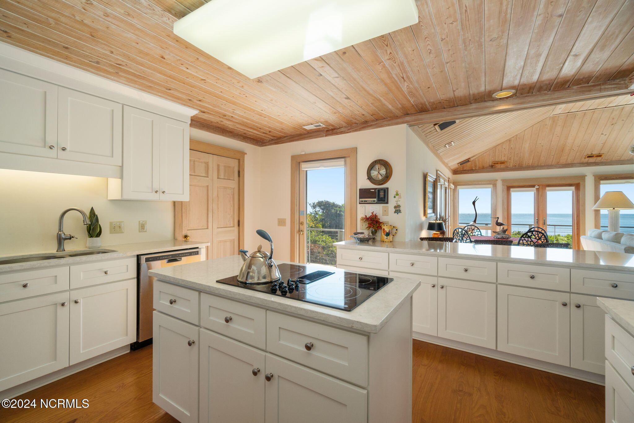 209 Salter Path Road Pine Knoll Shores, NC 28512 - Photo 6 of 73 Kitchen w/ island and peninsula seating