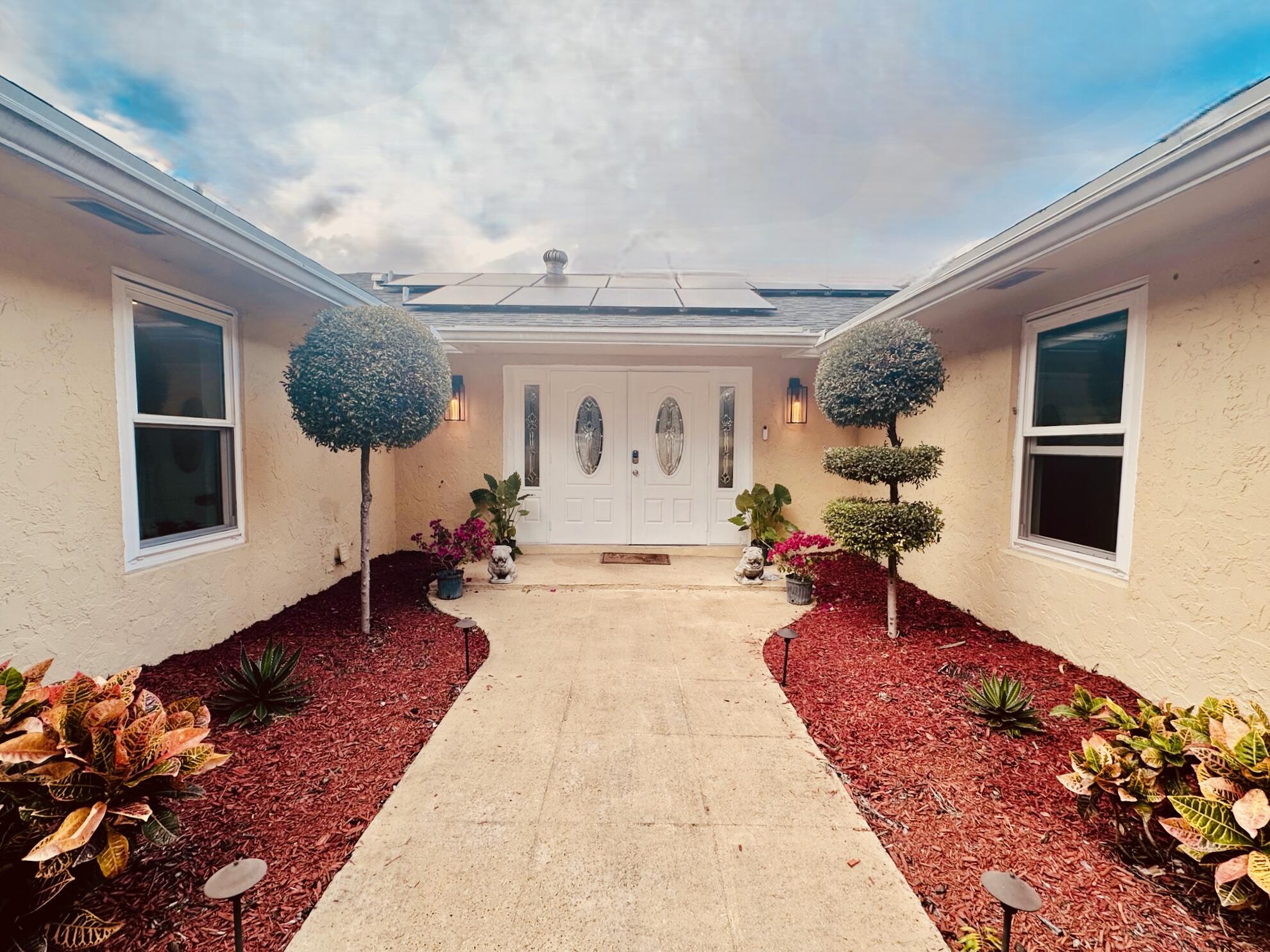 4540 Mathis Street Lake Worth, FL 33461 - Photo 2 of 40 Front 1