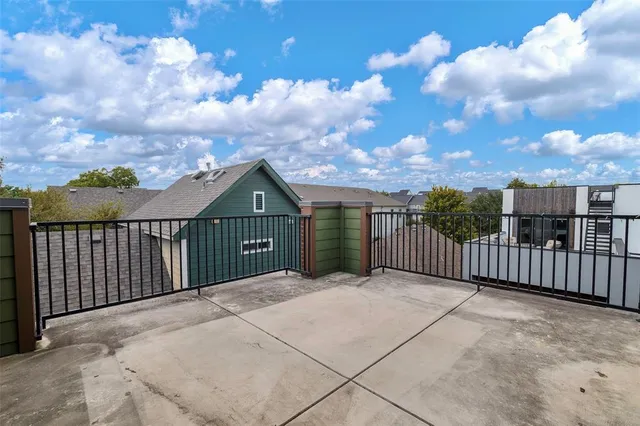 a view of a wrought iron fences in front of house