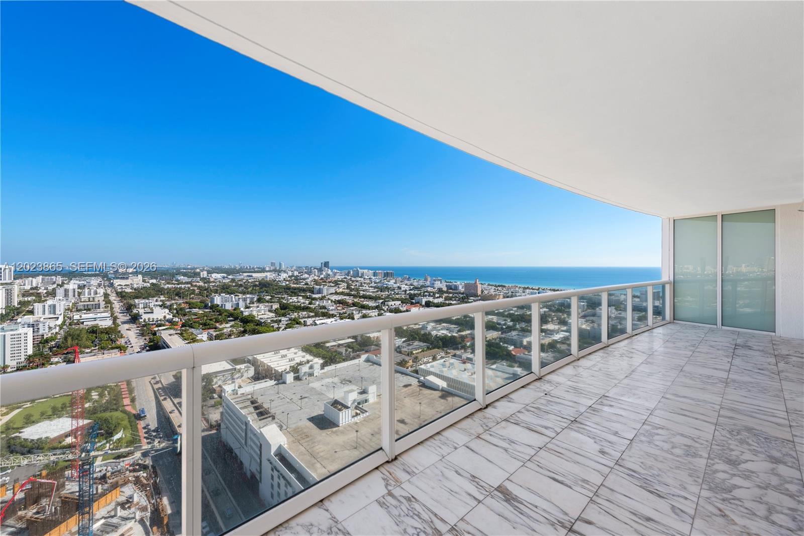 450 Alton Road, Unit 3206 Miami Beach, FL 33139 - Photo 24 of 25 an aerial view of a city