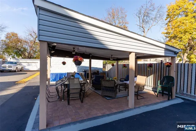 a patio with wooden floor