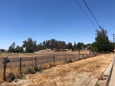 27475 Cornell Street Hemet, CA 92544 - Photo 6 of 19 a view of tall trees with wooden fence