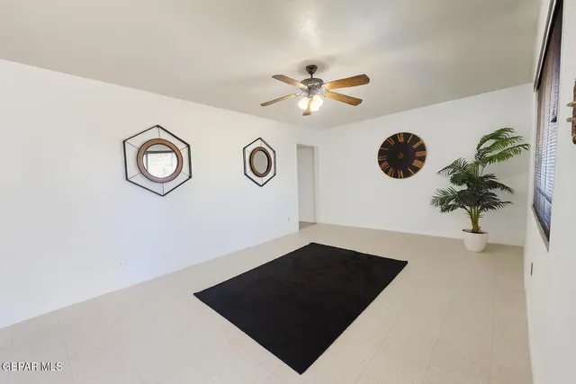 a kitchen with a sink a stove top oven and cabinets