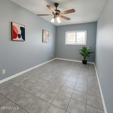 a bathroom with a toilet sink vanity and shower