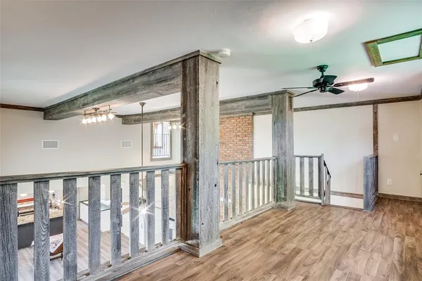 a view of entryway with wooden floor