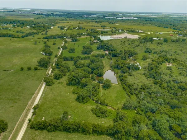 a view of a lake with a city