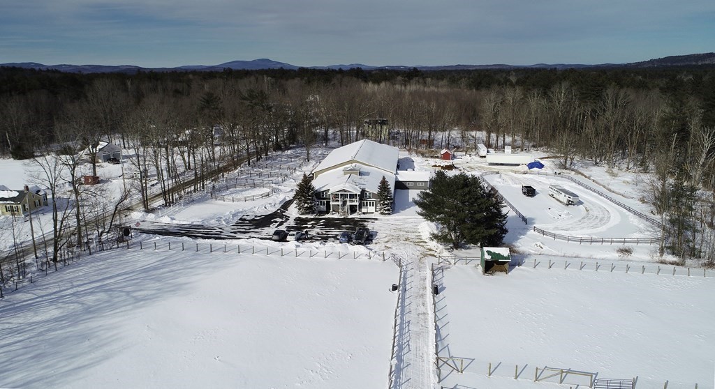 295 Stumpfield Road Hopkinton, NH 03229 - Photo 30 of 36 a view of a lake with houses