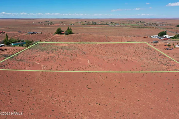 an aerial view of beach and ocean