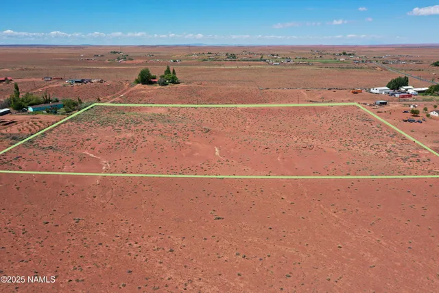 an aerial view of beach and ocean