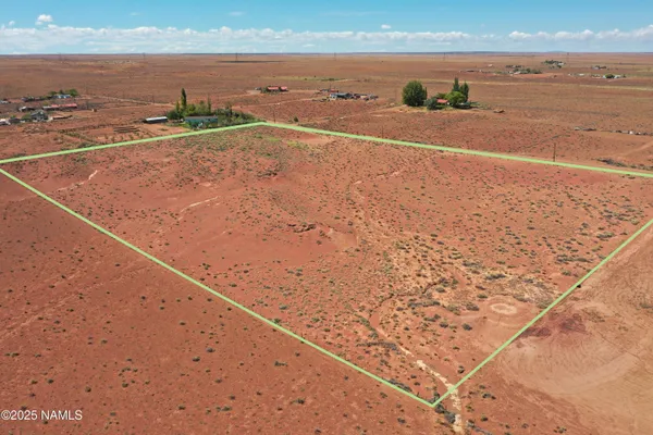 an aerial view of beach and ocean