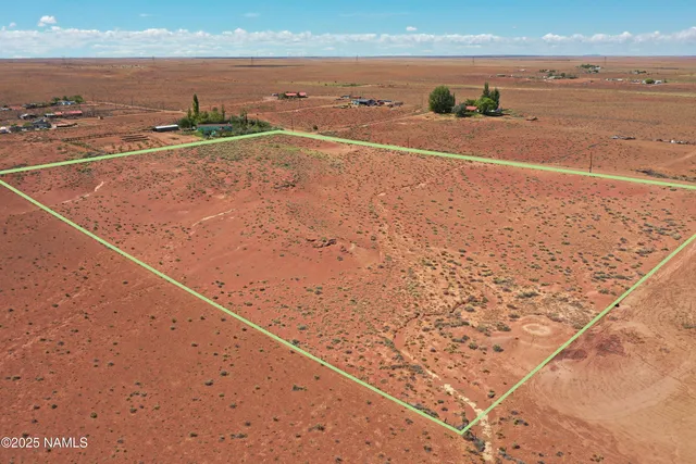 an aerial view of beach and ocean