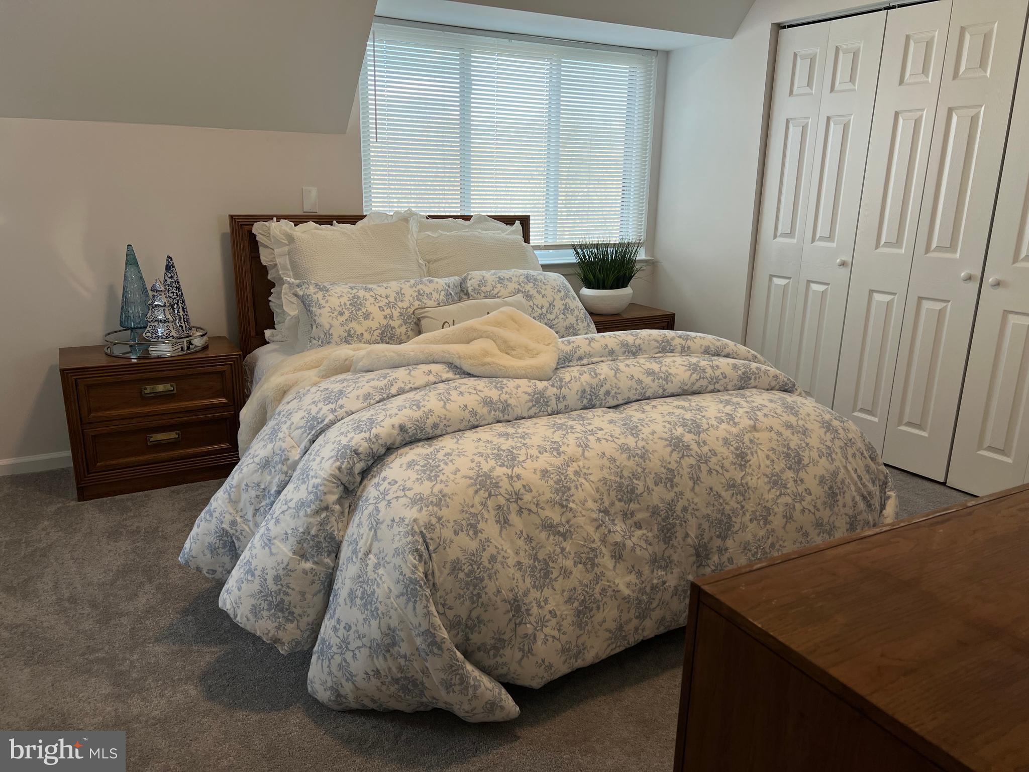 1546 Scandia Circle Reston, VA 20190 - Photo 19 of 24 a bedroom with a bed and a window