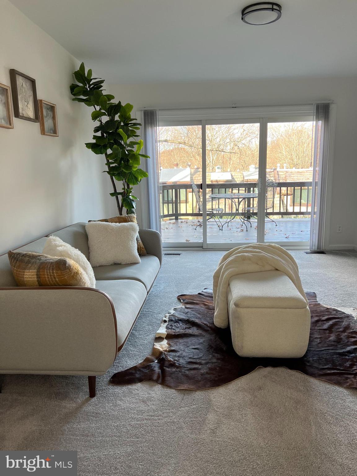 1546 Scandia Circle Reston, VA 20190 - Photo 6 of 24 a living room with furniture and a large window