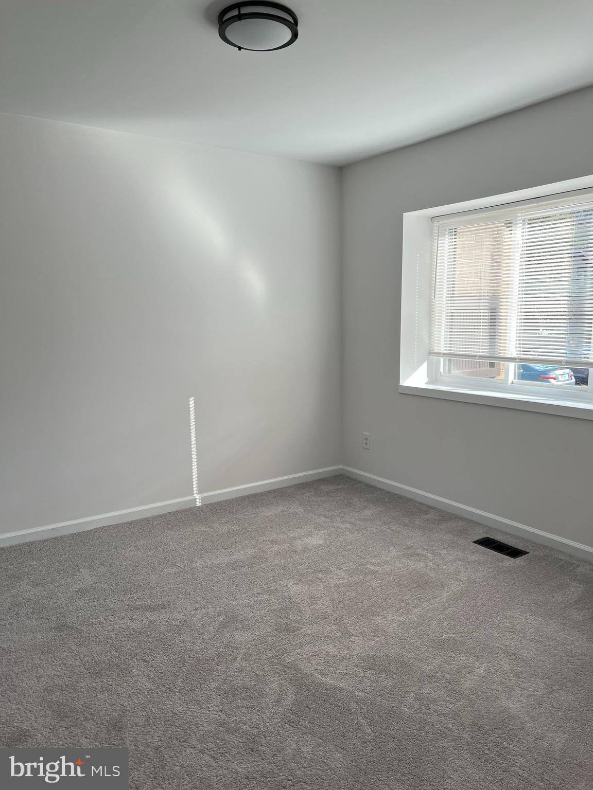 1546 Scandia Circle Reston, VA 20190 - Photo 7 of 24 a view of an empty room with a window