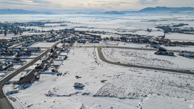 652 Cherry Ridge Lane, Unit 38 Richmond, UT 84333 - Photo 5 of 7 Snowy aerial view with a mountain view