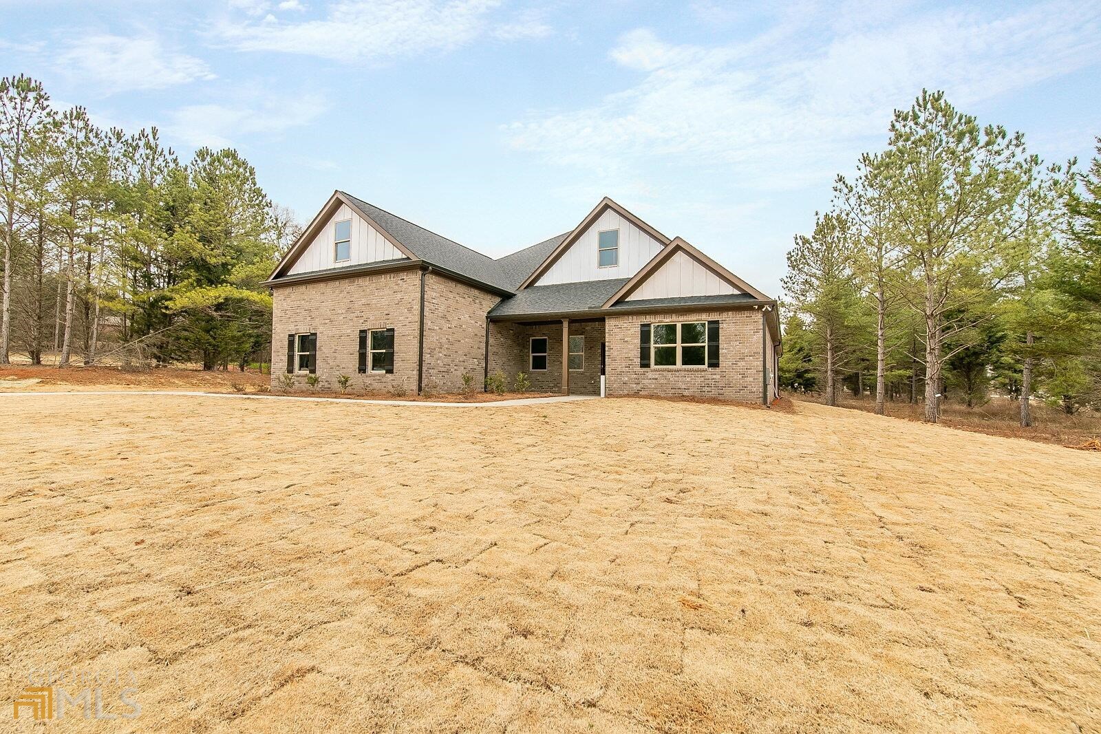 11 Lovell Road Temple, GA 30179 - Photo 1 of 1 a house with trees in the background